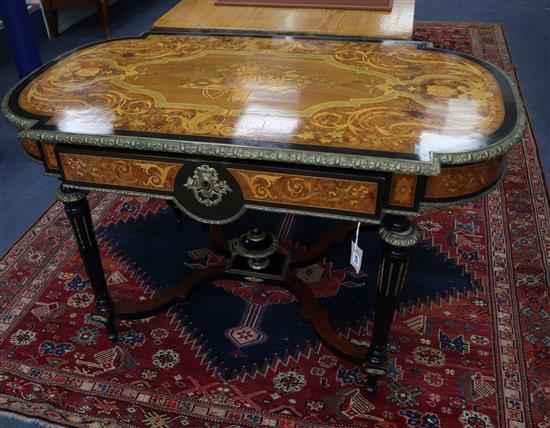 A Louis XVI style marquetry inlaid centre table, with shaped X stretcher W.127cm